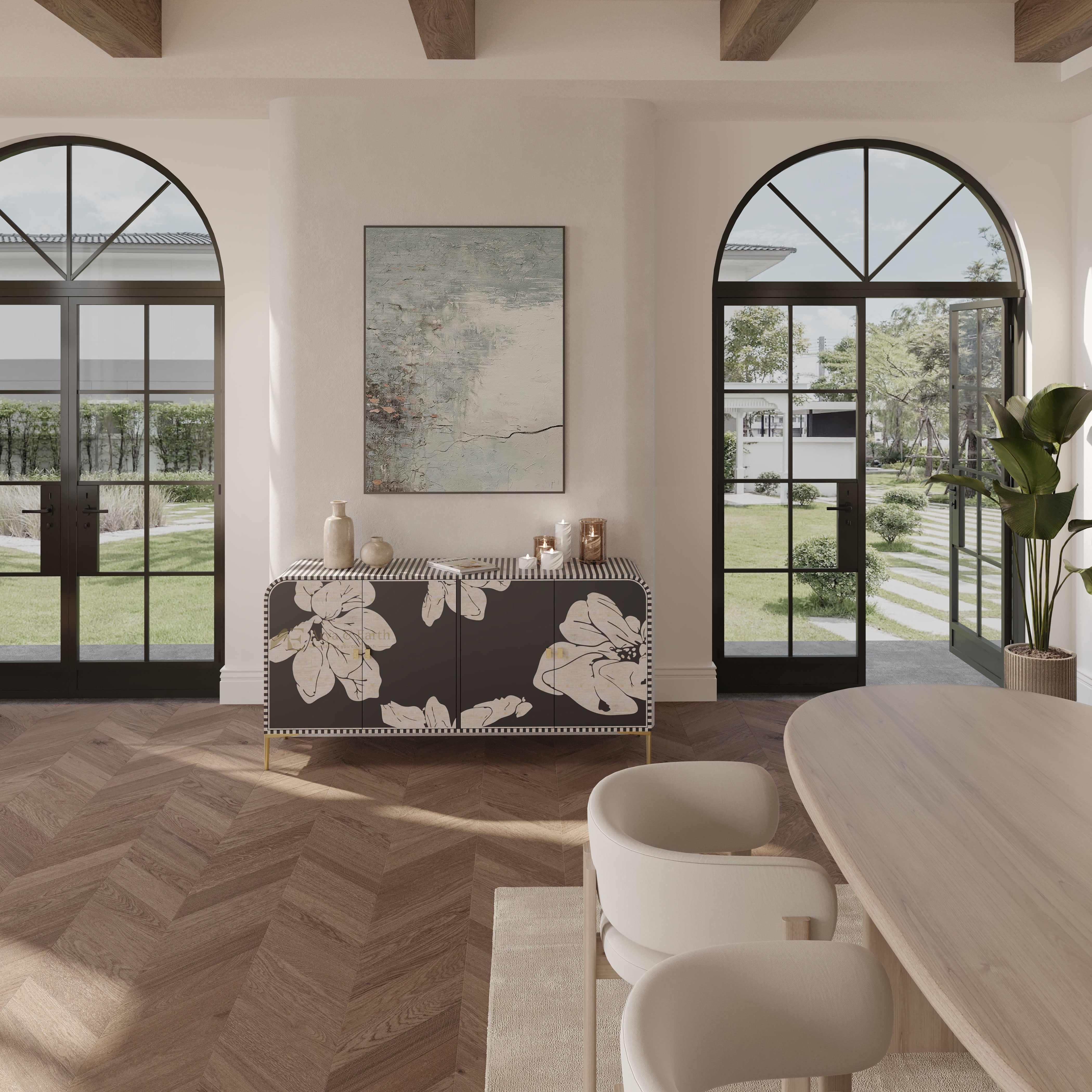 A modern dining room interior featuring a black sideboard with a white floral pattern, set against a white wall with arched windows looking onto a green garden.