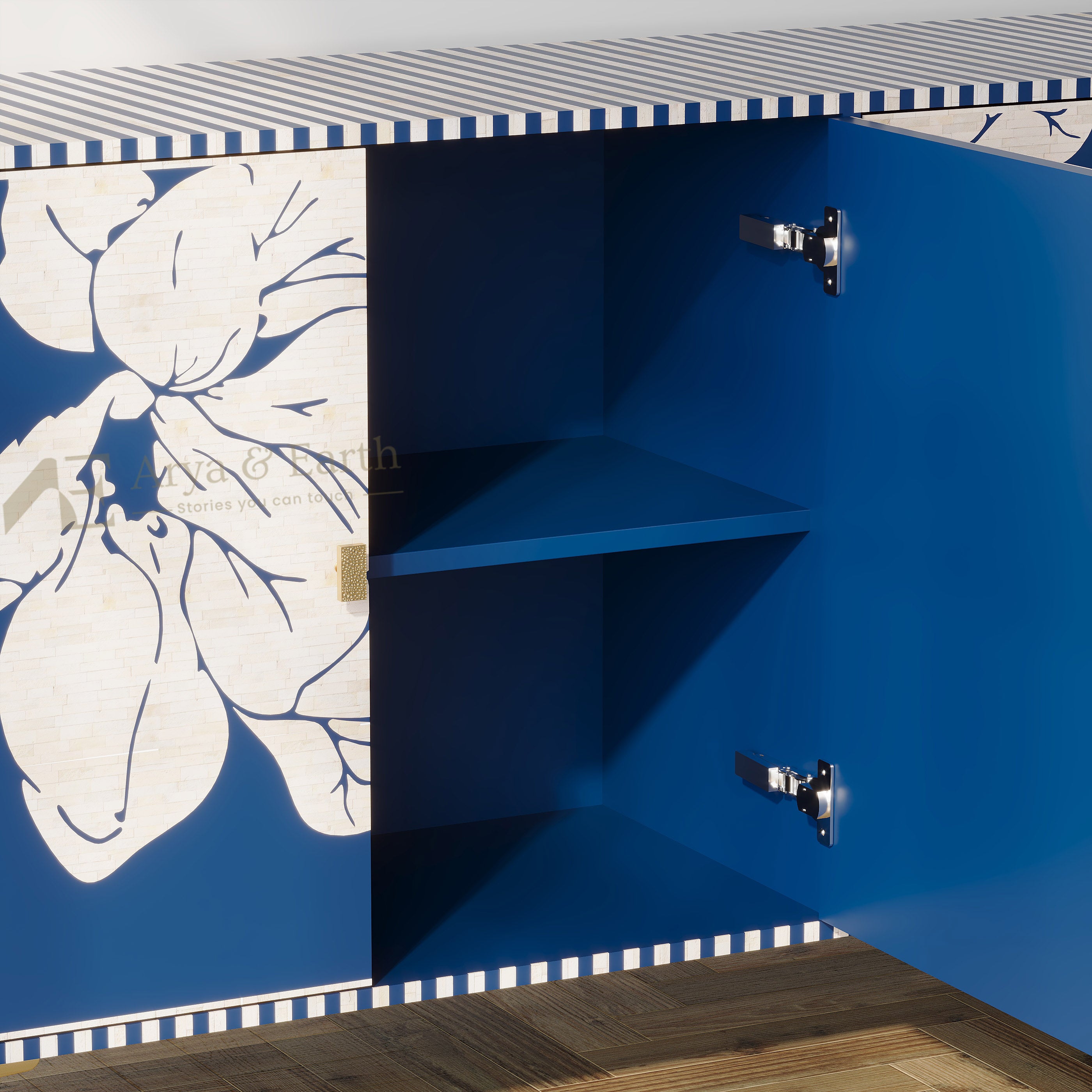 A blue wooden cabinet with a white floral print on one door and a striped top edge, shown open to reveal two interior shelves and metal hinges.