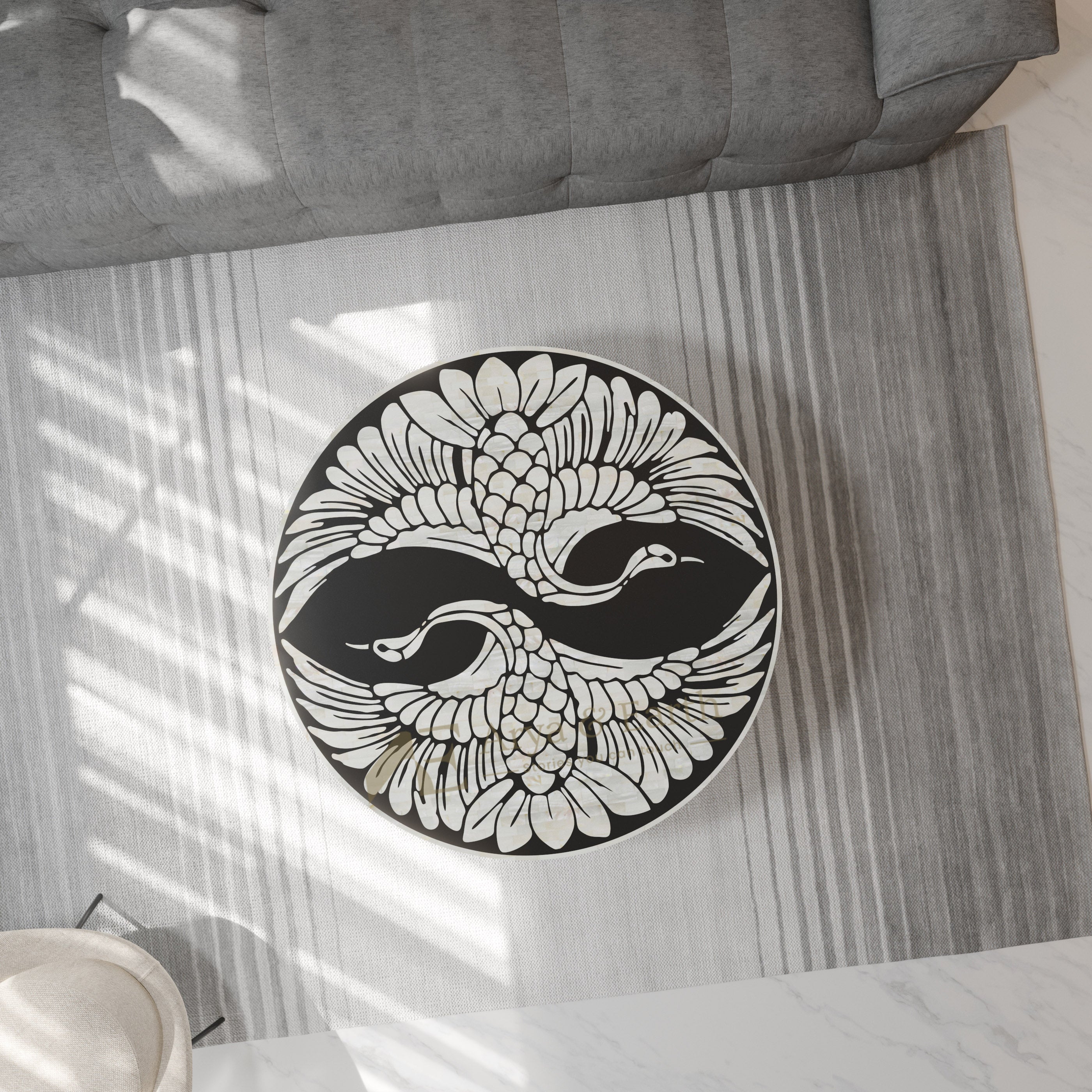 Top view Bone Inlay Black Round Coffee table with phoenix design in a living room