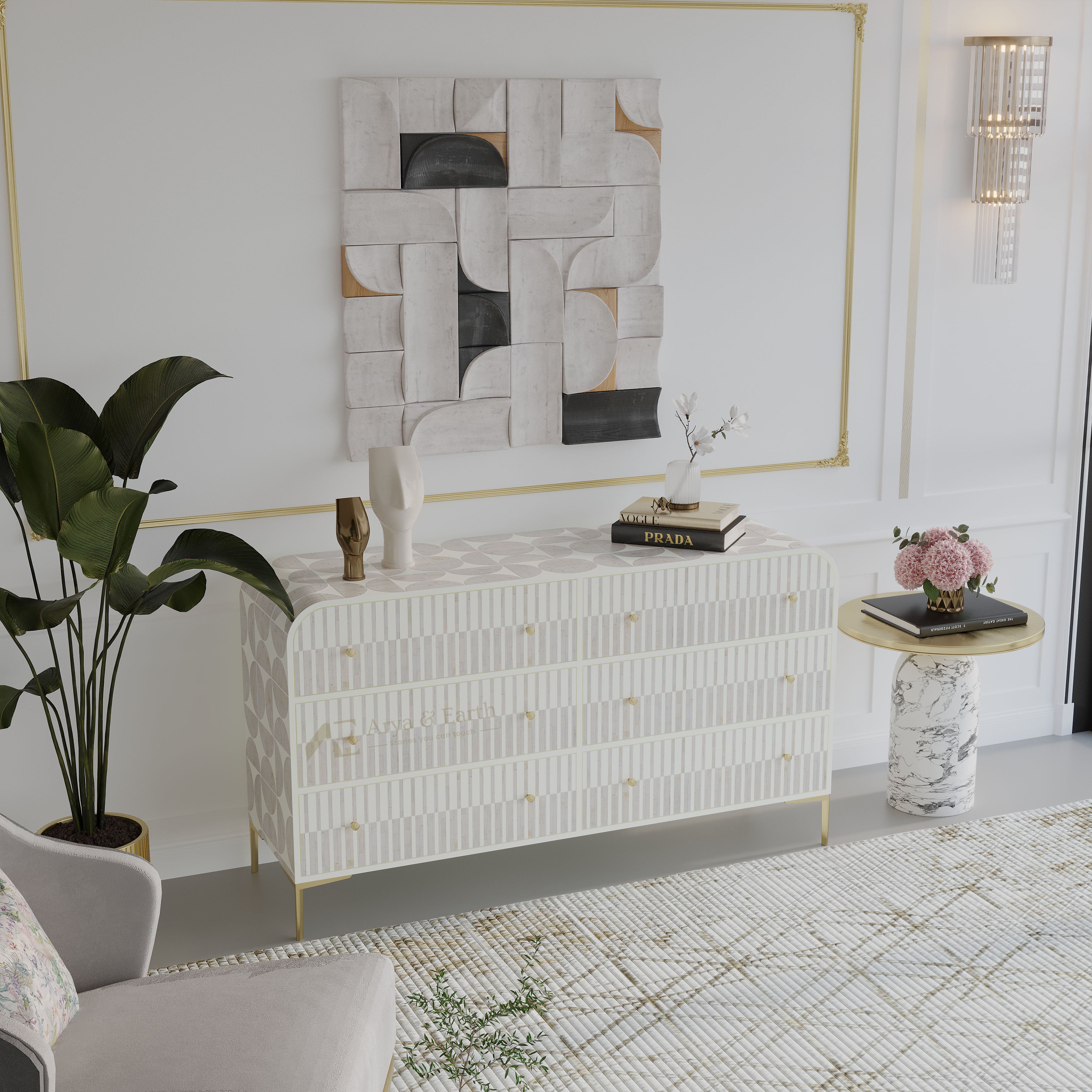 A modern white ribbed console table with gold legs and small gold knobs, styled in a bright living room setting with a large abstract wall art piece, a potted plant, and a marble side table.
