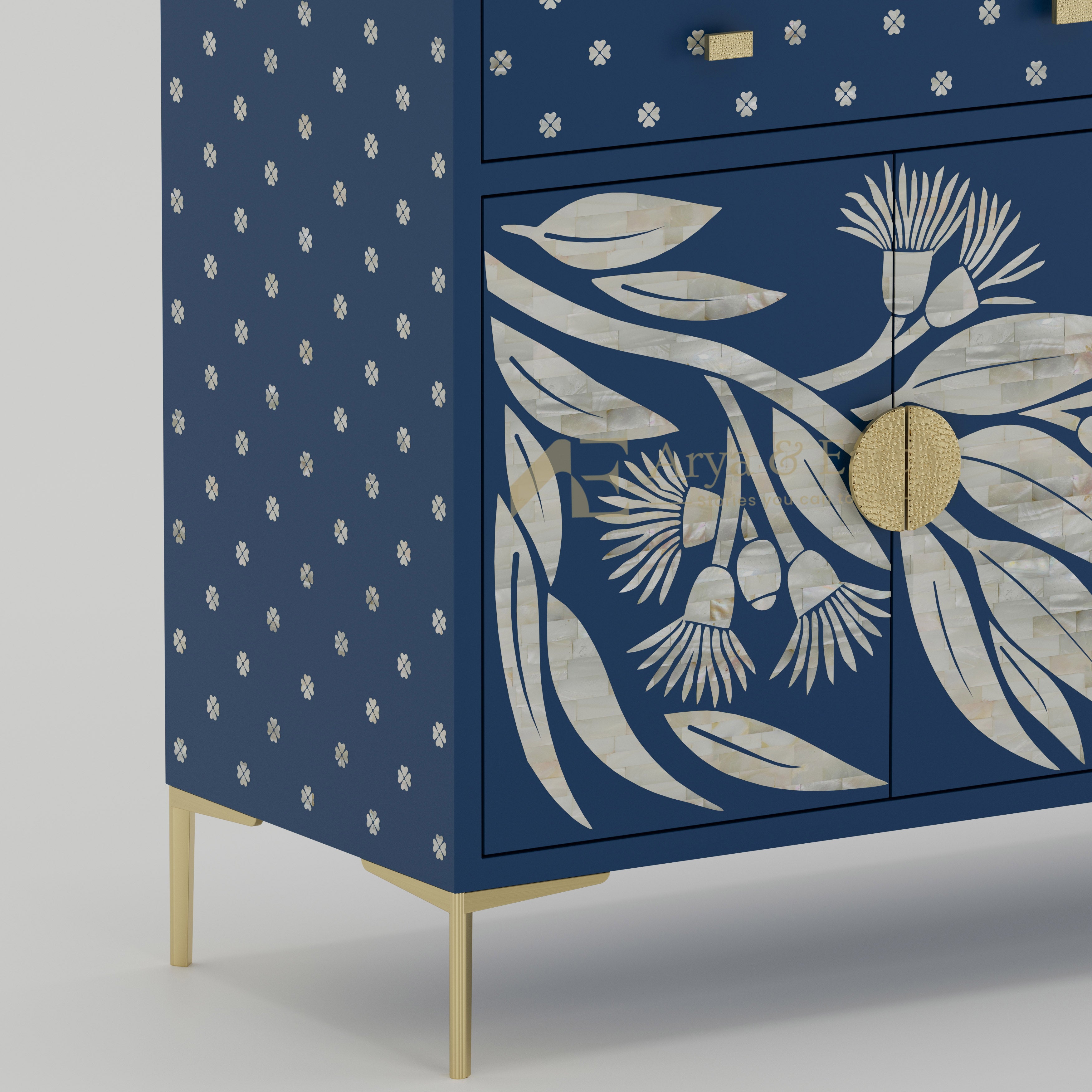 Mother of pearl inlay details on a Blue cabinet with floral design and gold accents.