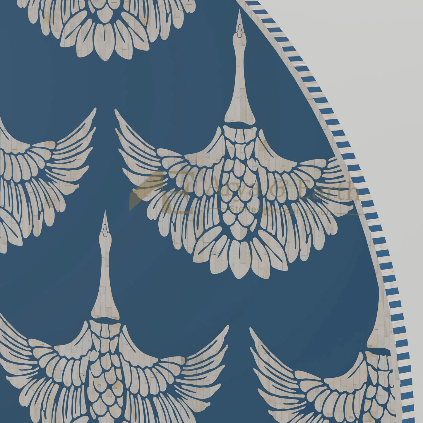 Pattern of phoenix birds in bone inlay with a blue background