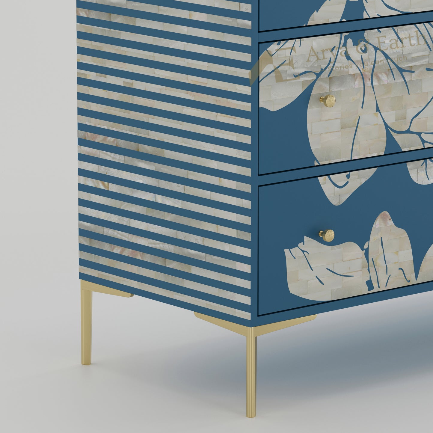 closeup of Blue dresser with white stripe pattern and floral designs