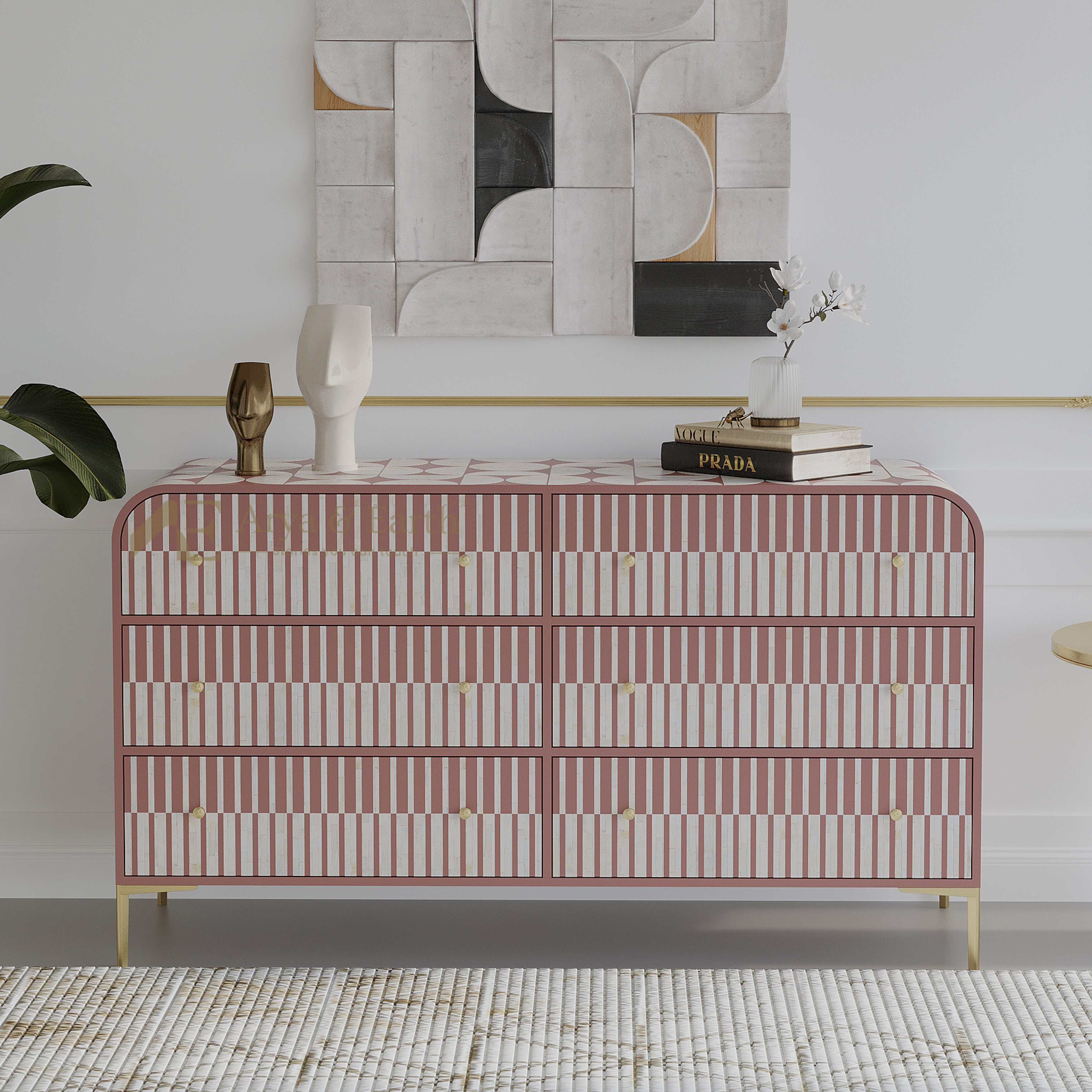 striped dresser in a stylish room with abstract art and decor.