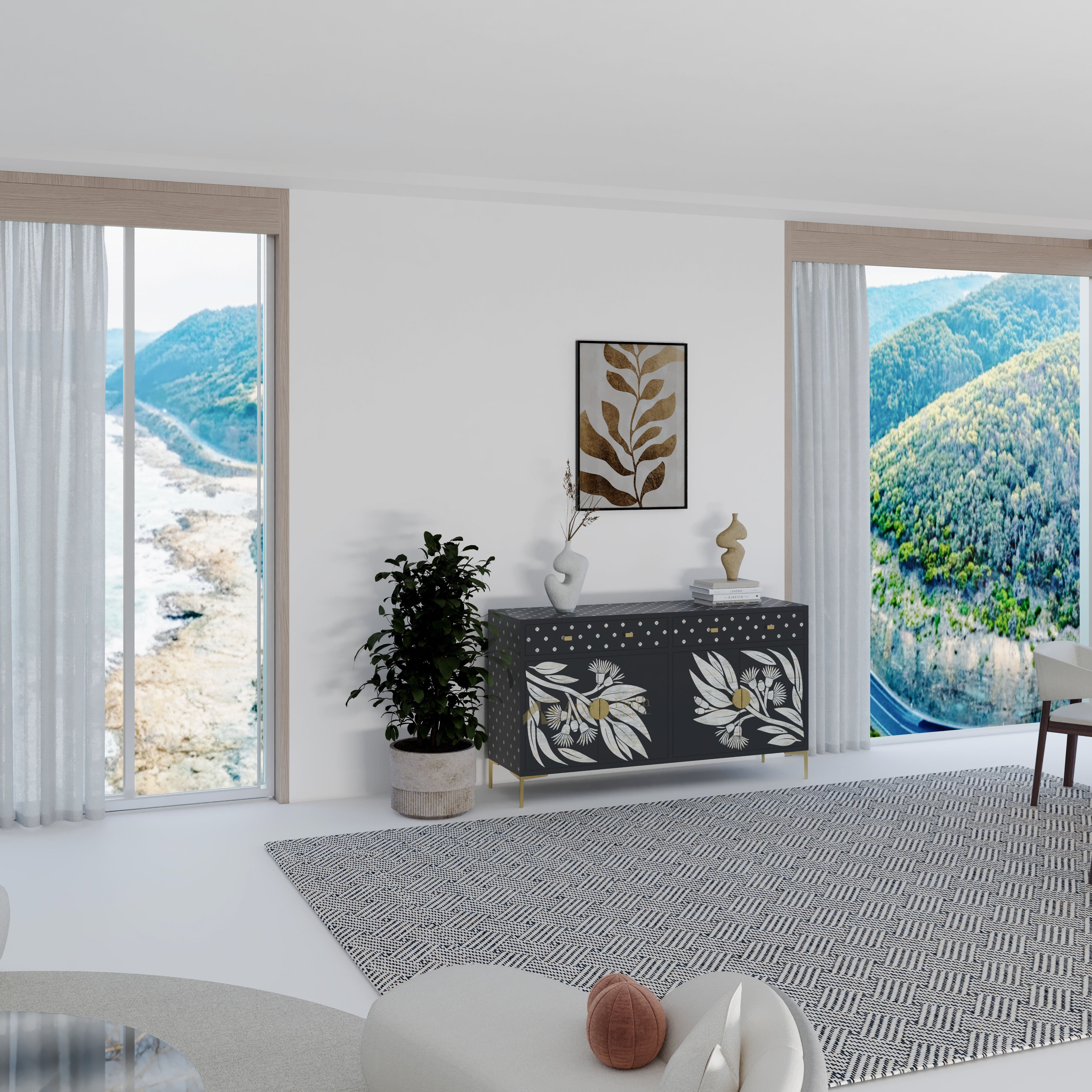 Modern living room with black cabinet and a view of mountains.