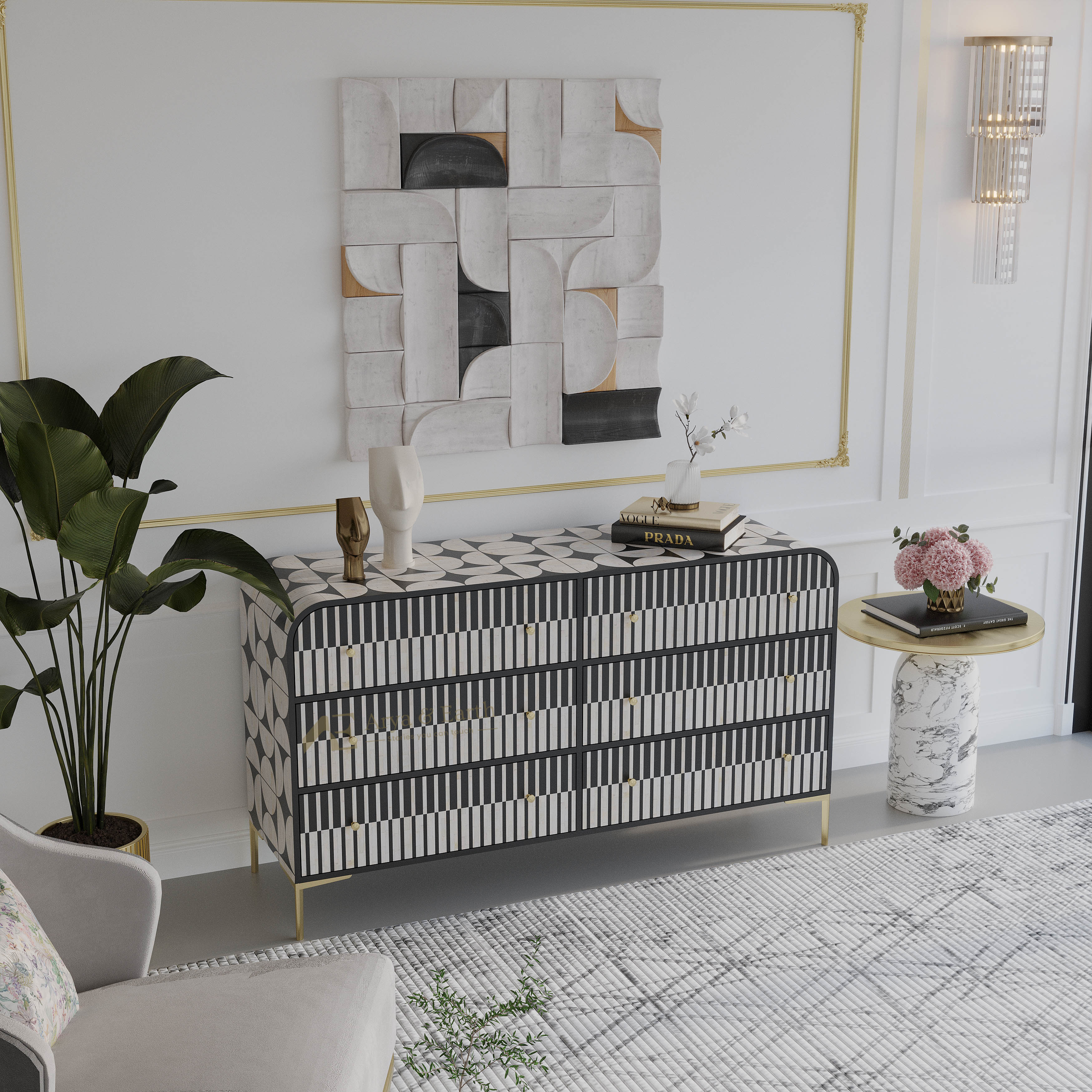 A modern sideboard console with a black and white geometric striped pattern and gold legs, styled in a bright living room setting under a gold-framed abstract canvas print.