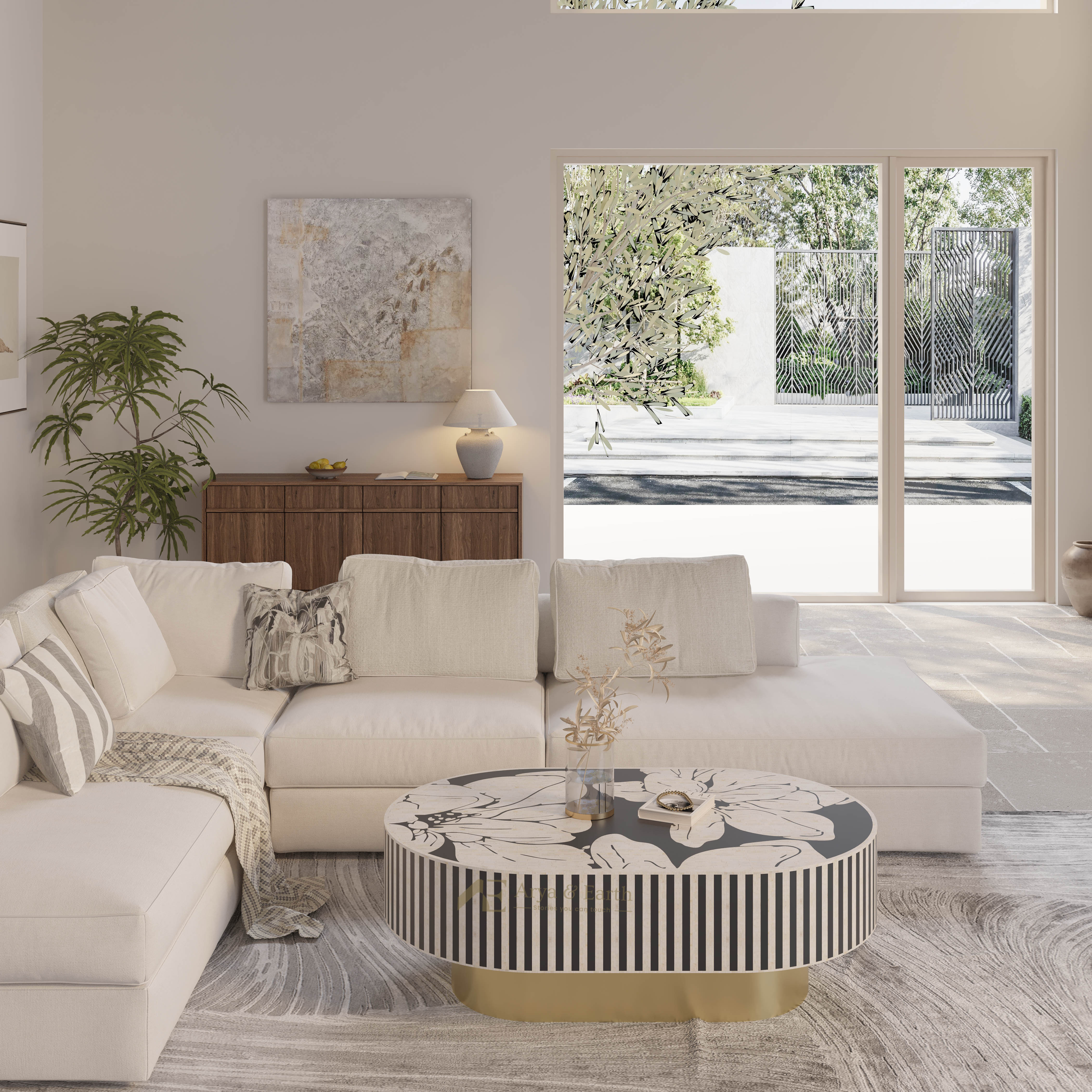 Bone inlay oval floral coffee table in a living room with large window