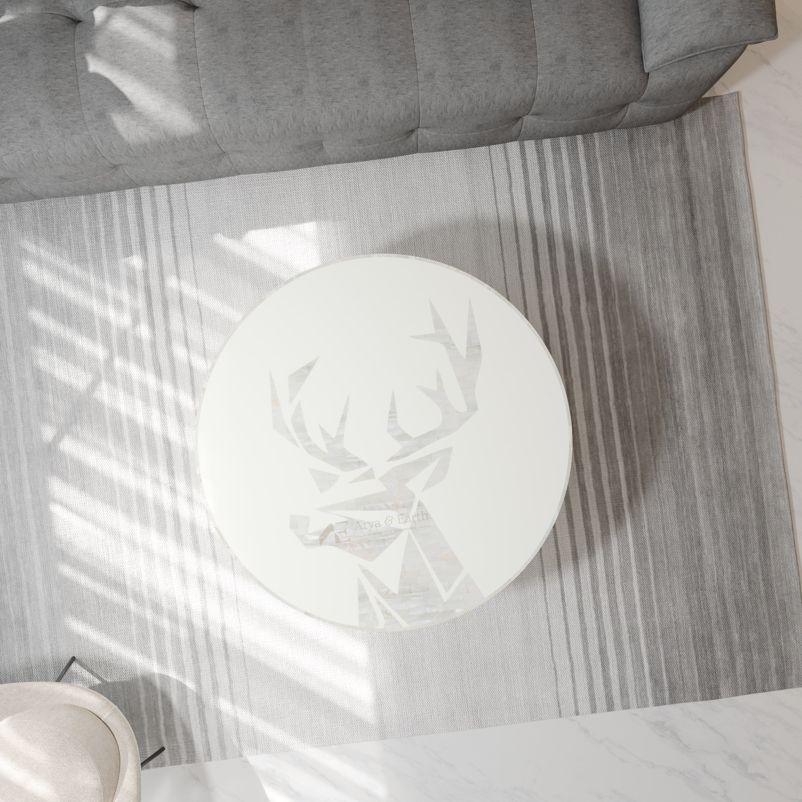 Top view of White Mother of Pearl Round coffee table in a living room.
