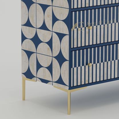 Blue and white geometric patterned dresser with gold accents 