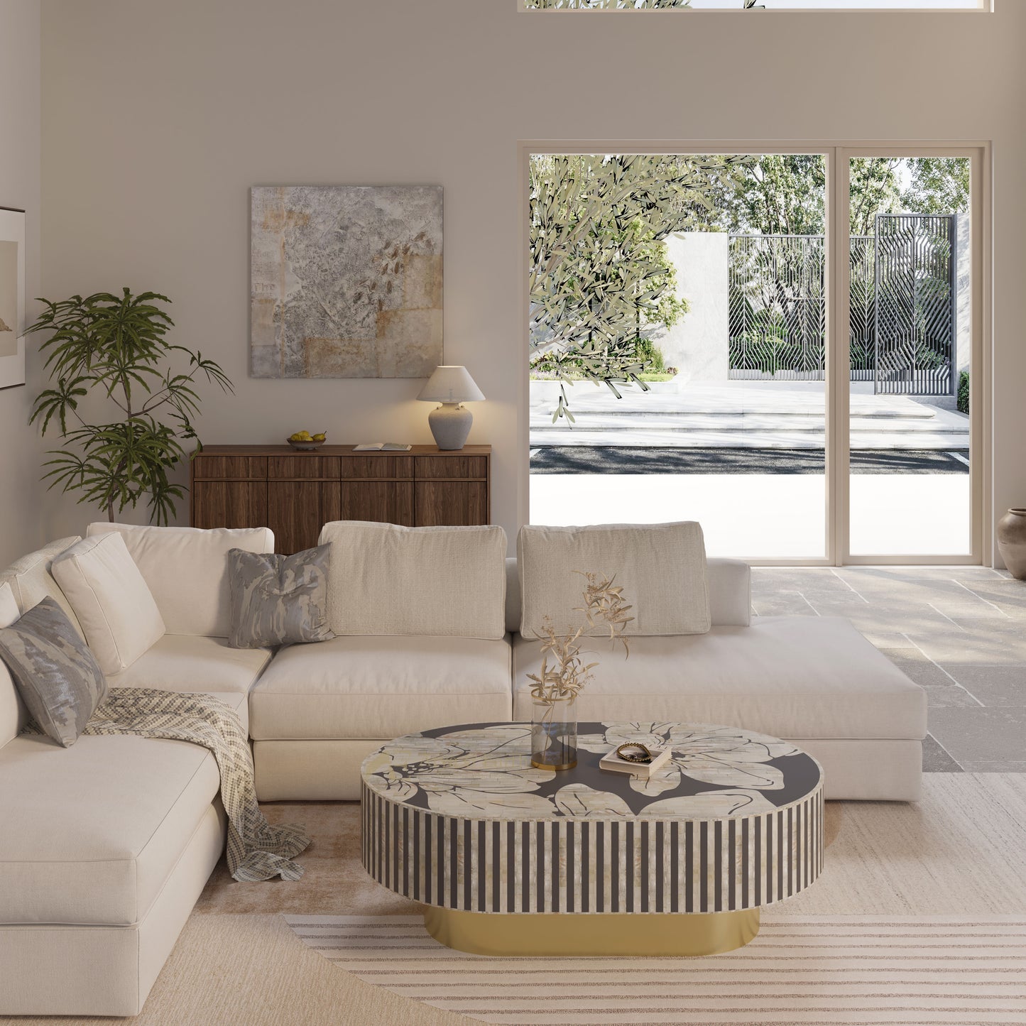 Luxury living room with a sofa, oblong coffee table with golden base, and large windows.