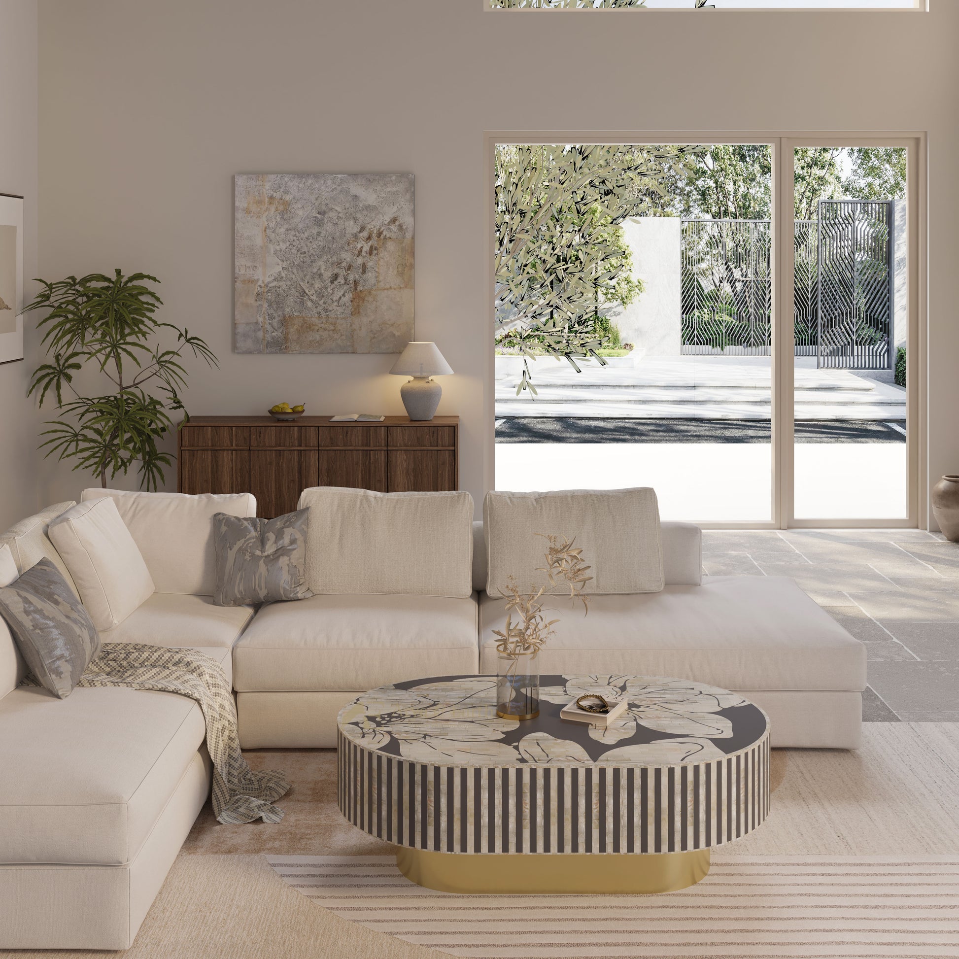 Luxury living room with a sofa, oblong coffee table with golden base, and large windows.