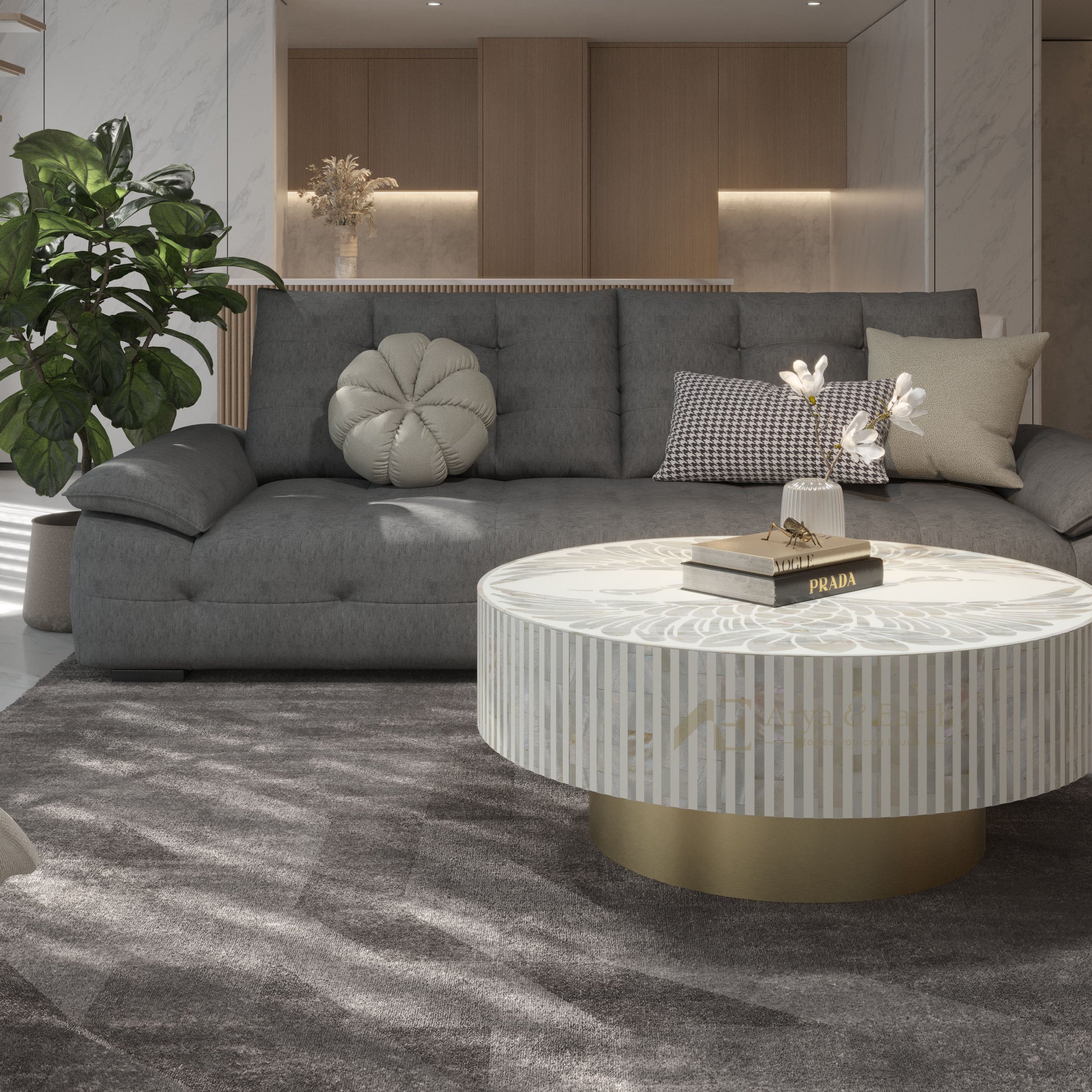 Modern living room with a gray sofa and white round coffee table.