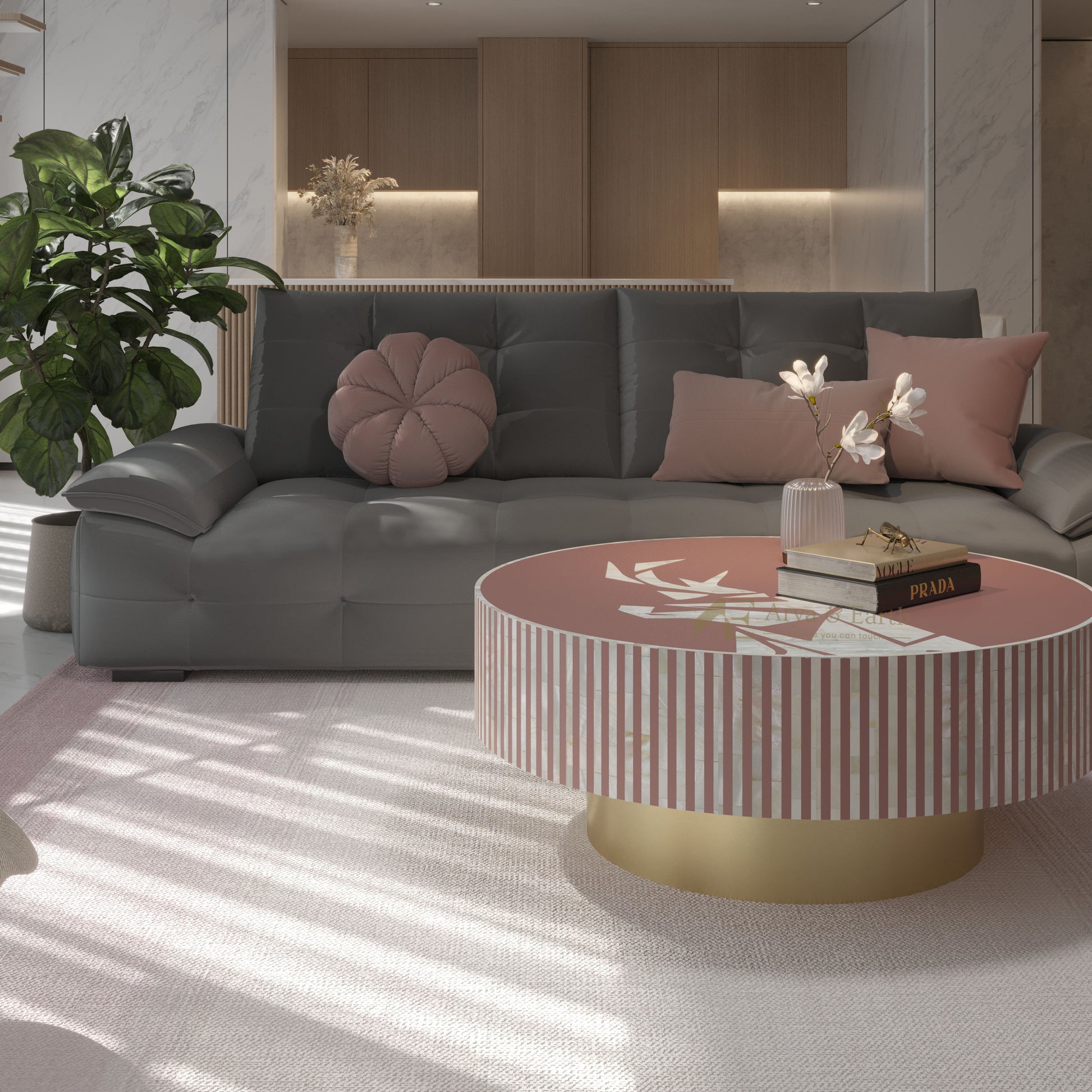 Modern living room with a gray sofa, round pearl inlay coffee table with golden base, and decorative items.