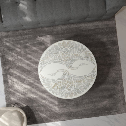 white pearl inlay pheonix design coffee table on a  rug