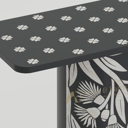 Closeup of bone inlay Black console table with gum tree design