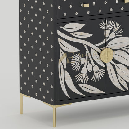 Details of bone inlay texture on a cabinet with floral patterns and gold accents