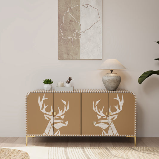 Beige Bone inlay cabinet with deer head designs in a room with a lamp and plants.
