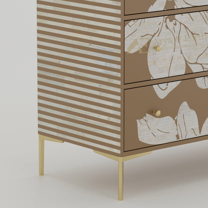 closeup of bone inlay floral pattern on a dresser