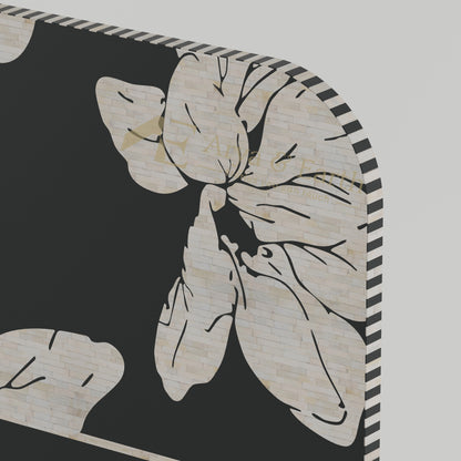 bone inlay floral pattern details on a head board
