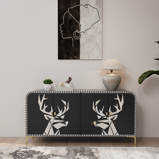 Modern interior with a black and white deer head cabinet, abstract art, and decorative items.