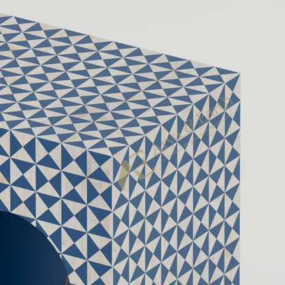 close up of the bone inlay geometric pattern on  console table 