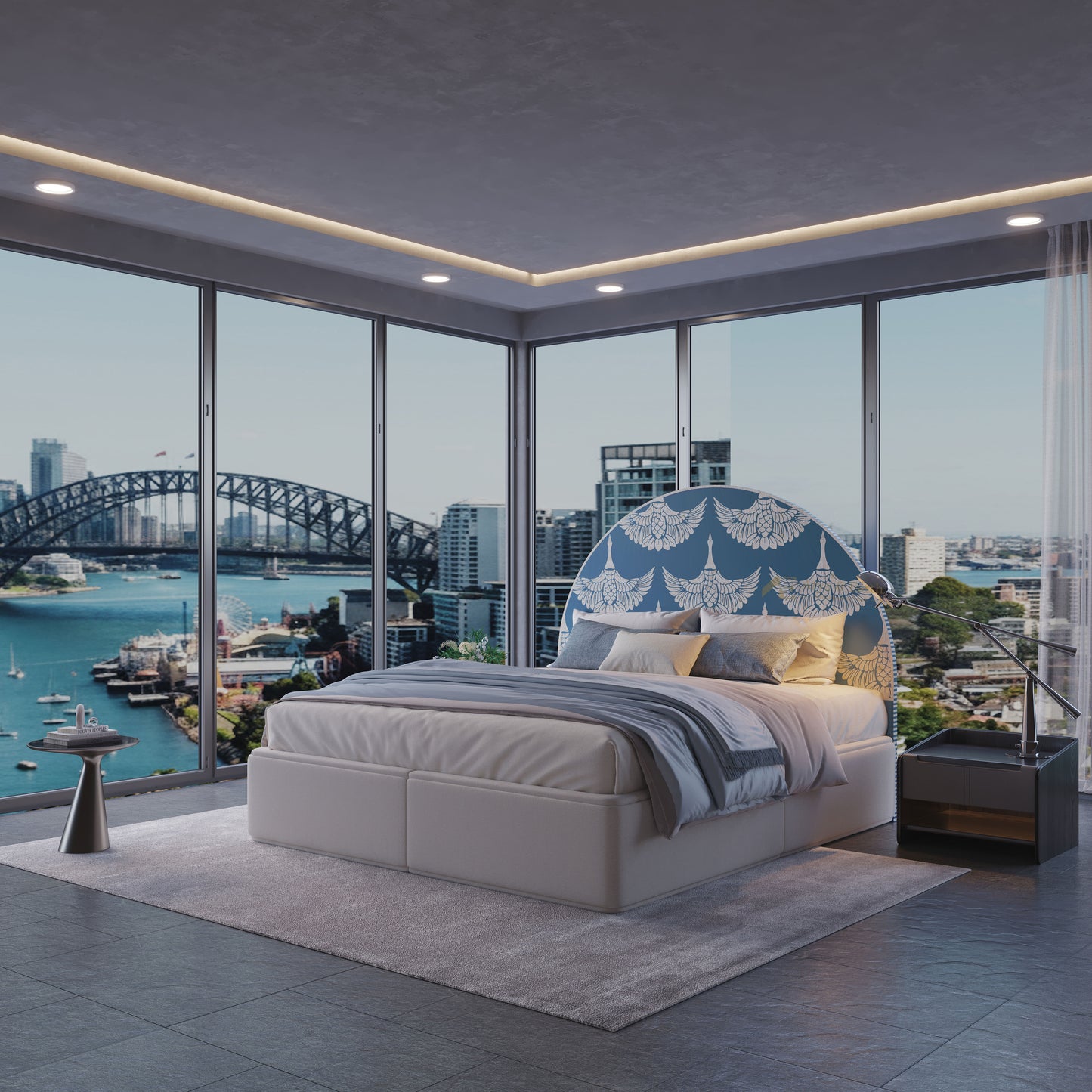 Modern bedroom with a blue bedhead and cityscape view through large windows