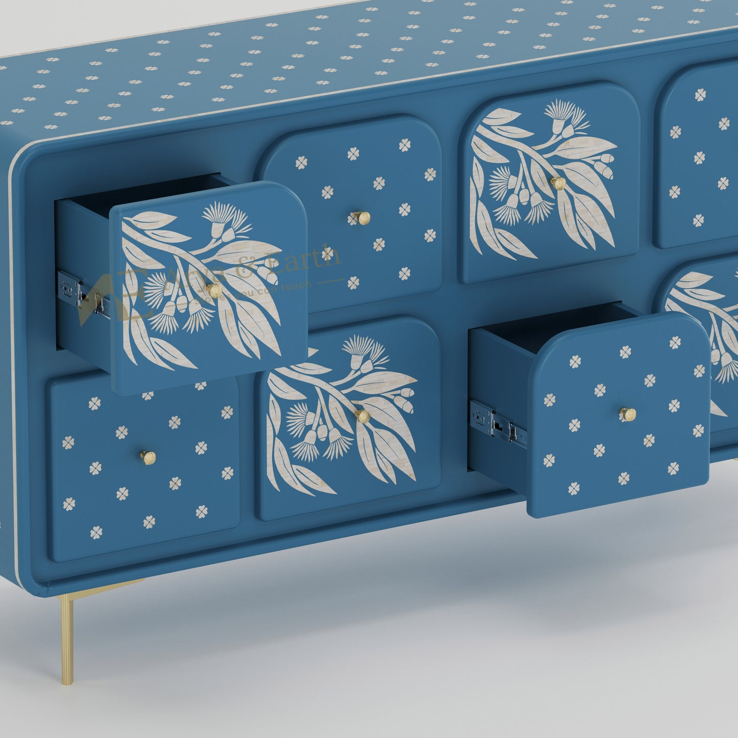 open drawers of blue bone inlay sideboard with floral patterns on a light grey background