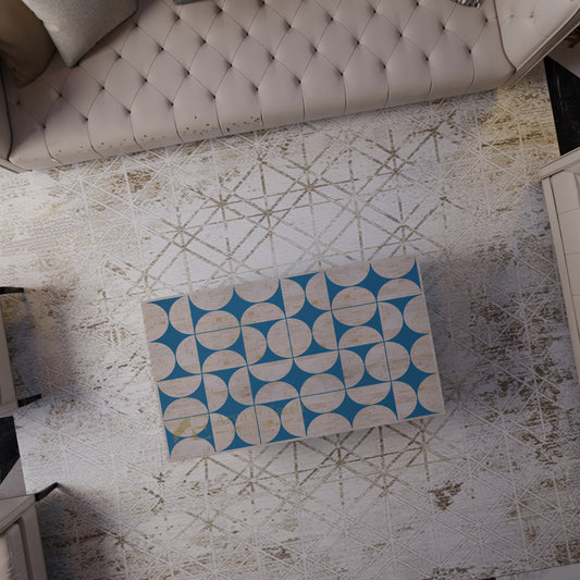 Blue bone inlay geometric rectangular coffee table on a textured rug