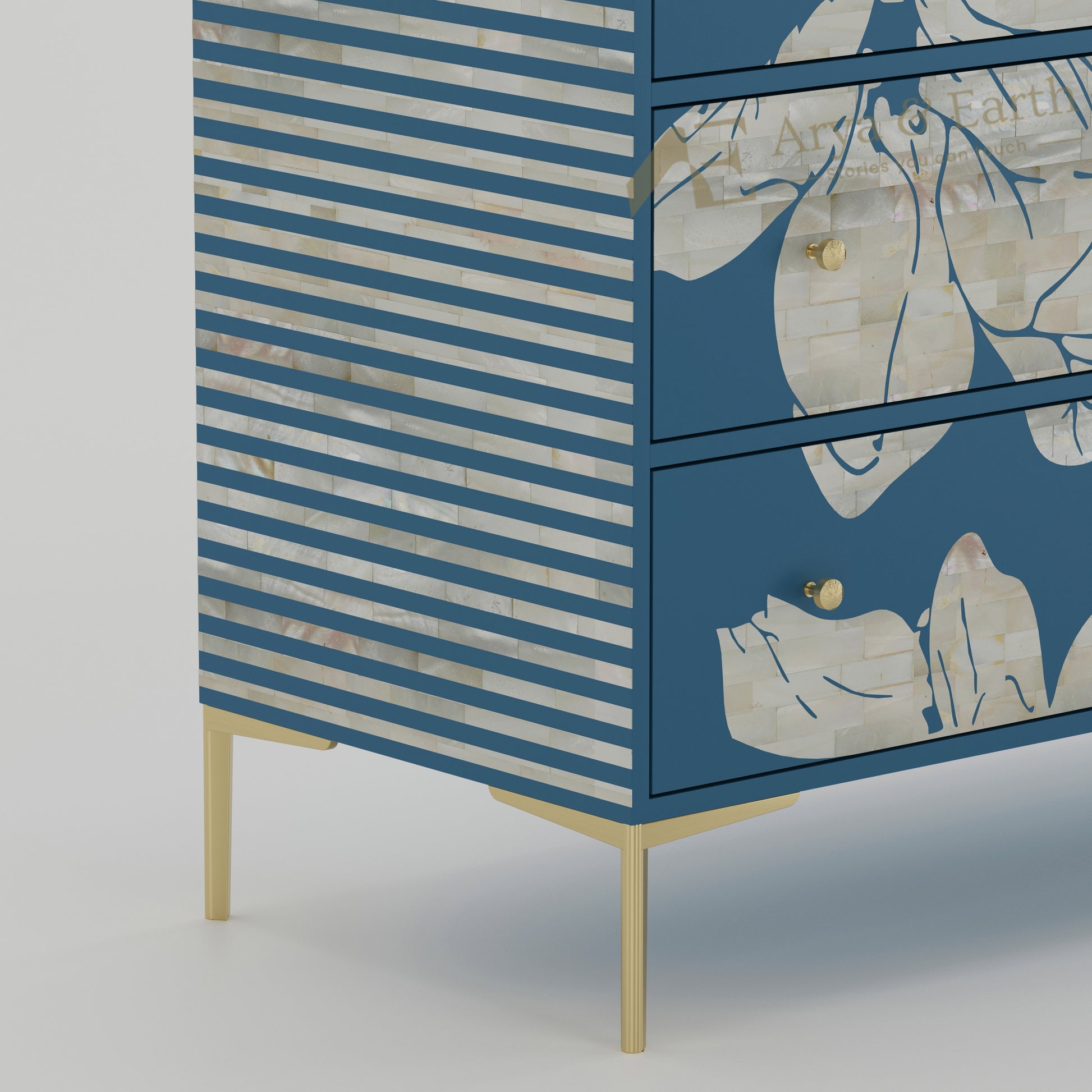 closeup of Blue dresser with white stripe pattern and floral designs 