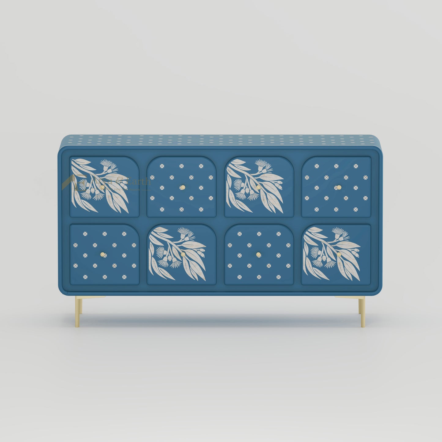 Blue sideboard with drawers with floral and geometric patterns on a light grey background
