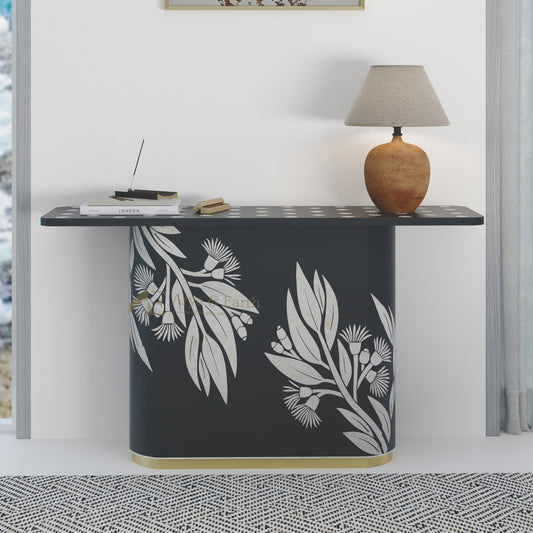 Console table with floral design on a white wall background