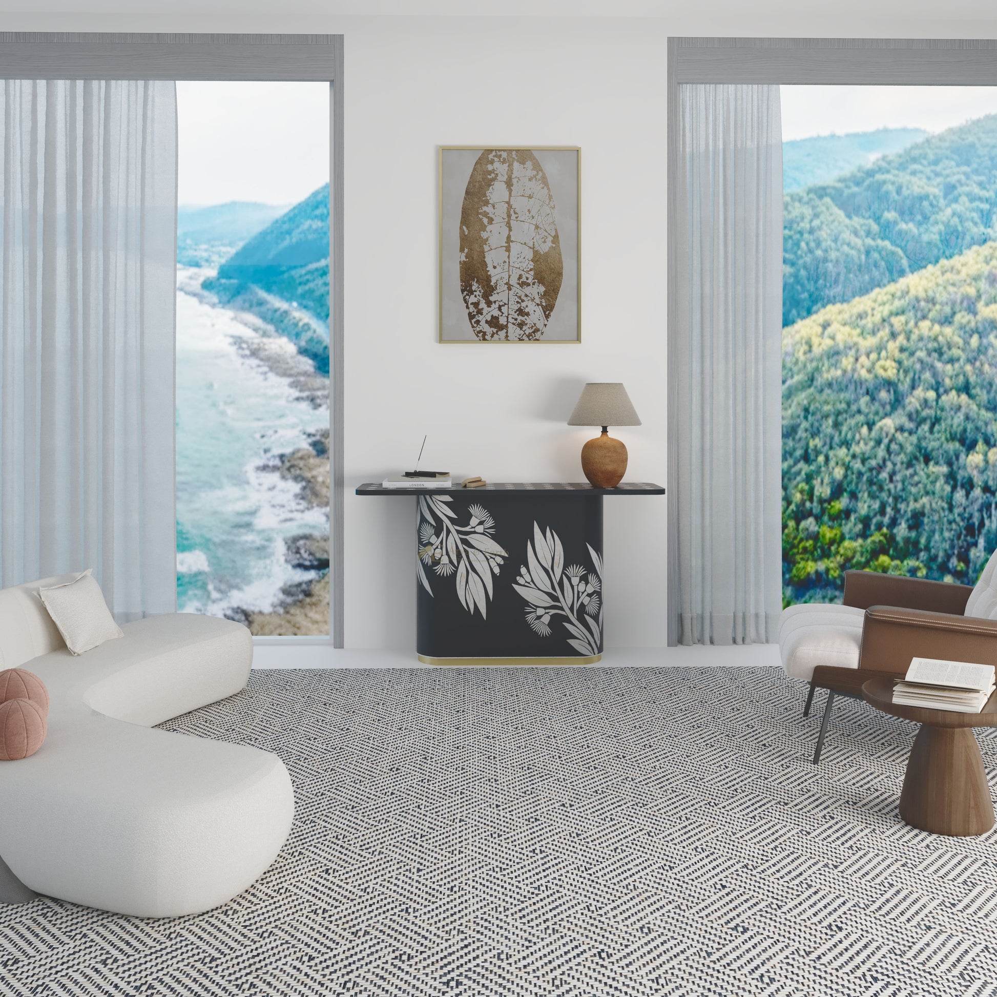 Modern living room with a scenic view of mountains and ocean through large windows with black console