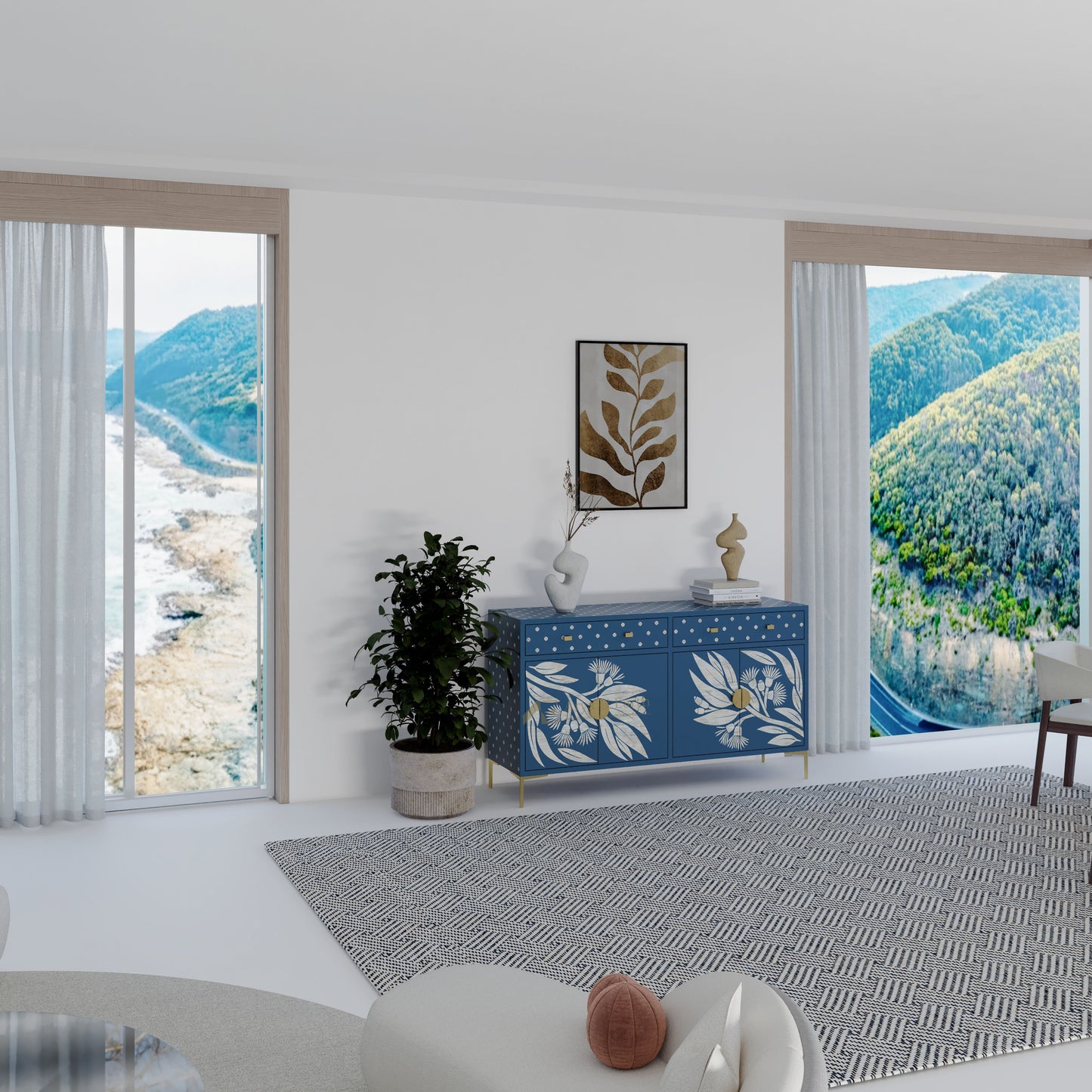 Modern interior with a blue cabinet, plants, and a scenic view.