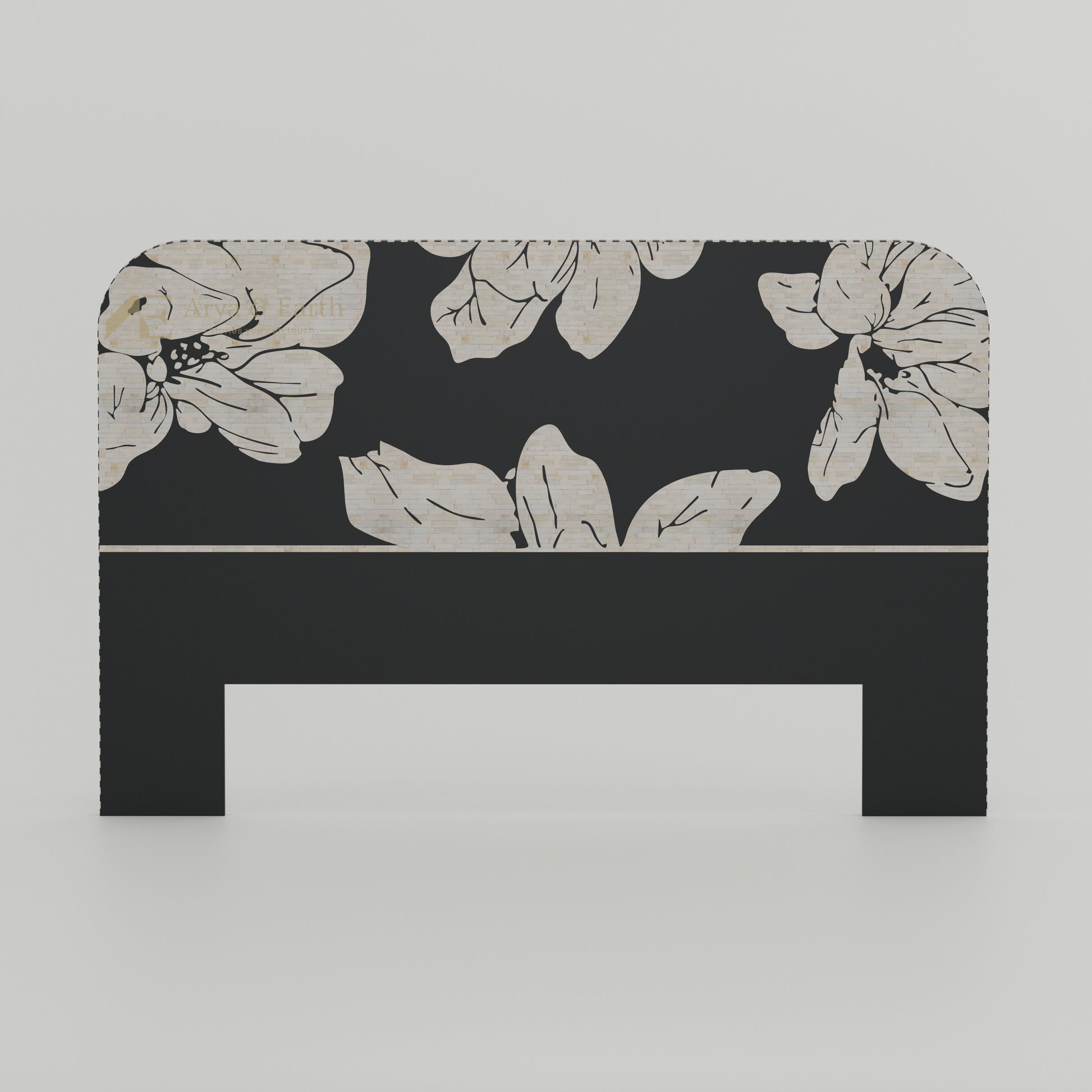Black headboard with floral pattern on a white background