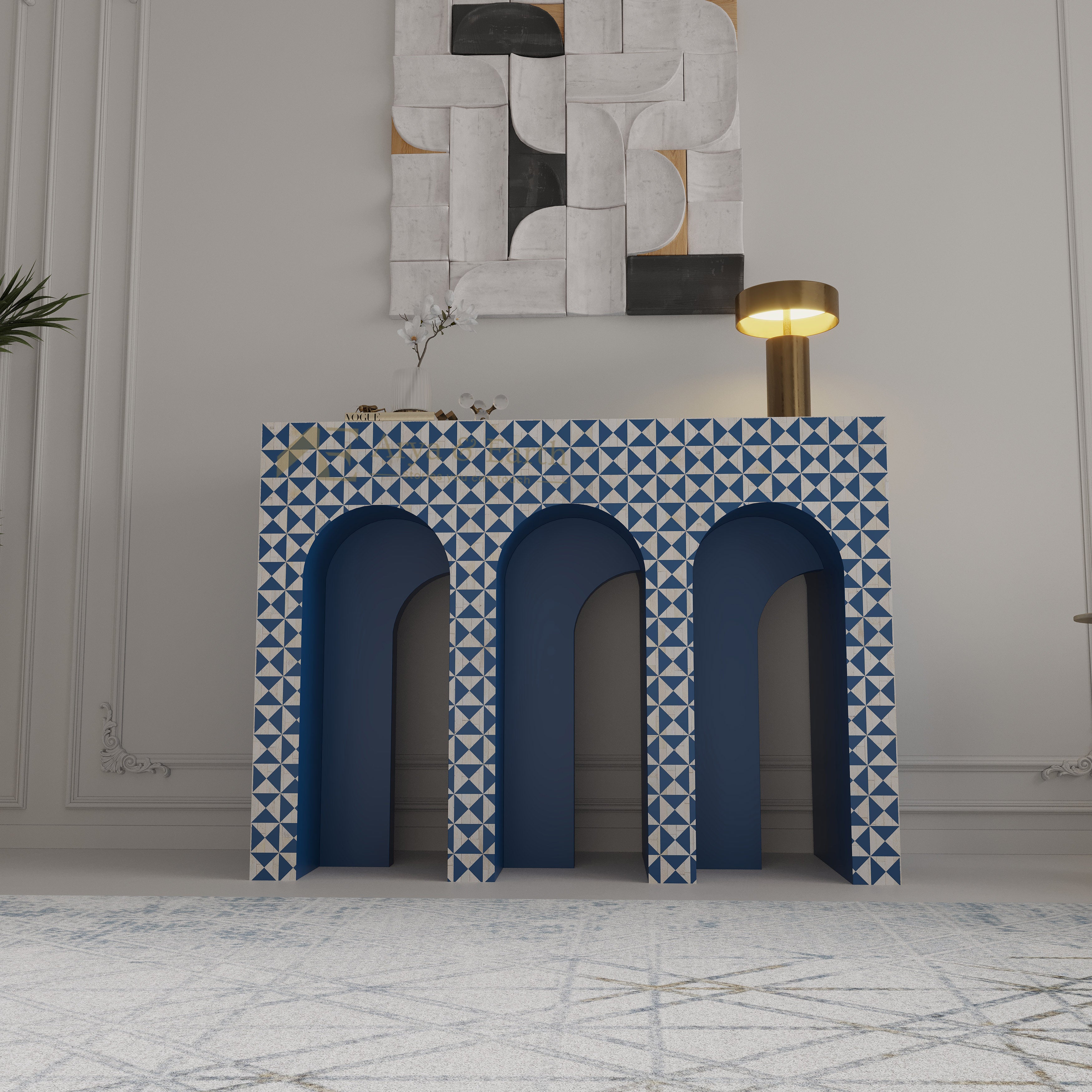 Bone inlay arched console with blue and white geometric pattern in a room with abstract wall art.