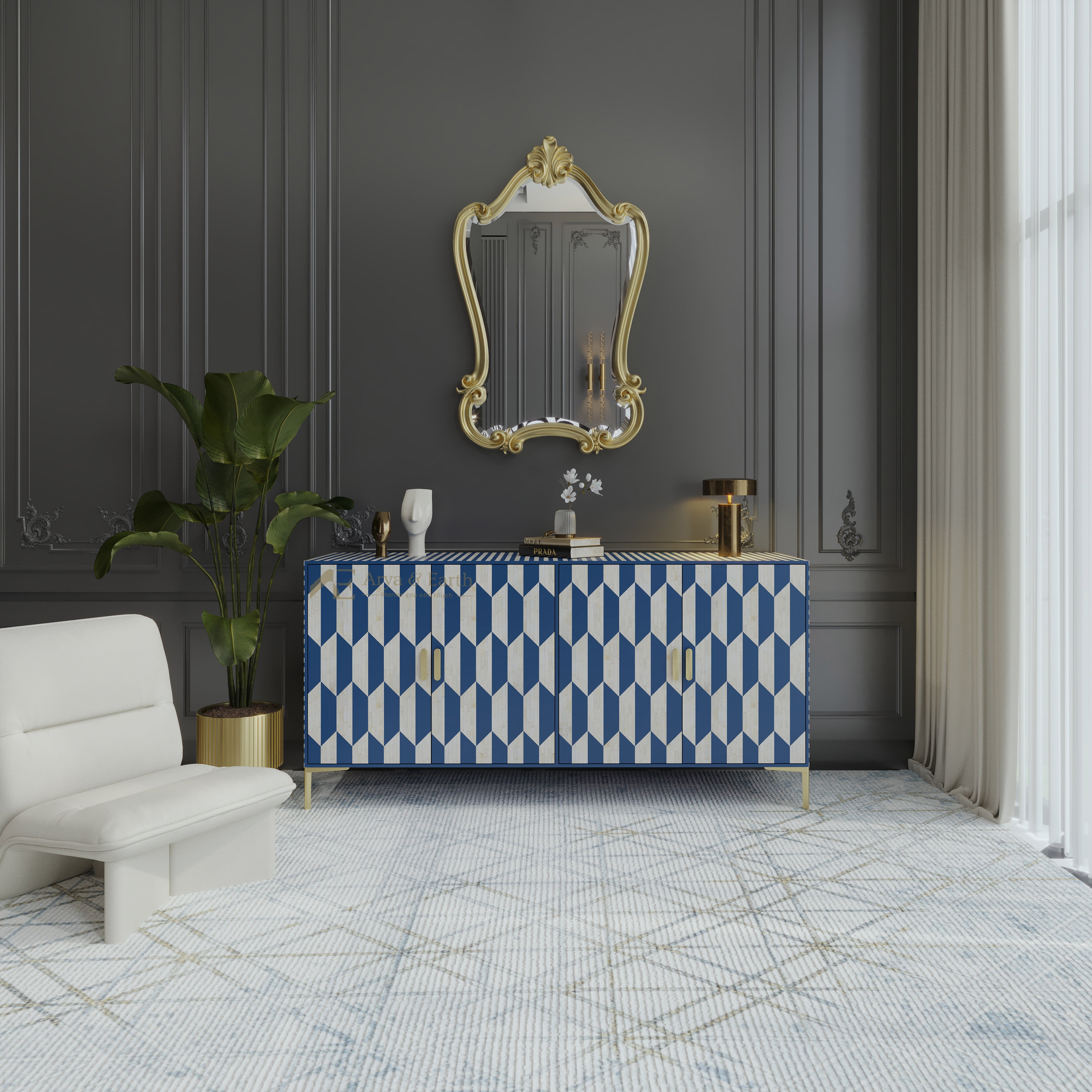 Art Deco style Modern interior with a blue and white patterned buffet cabinet, gold-framed mirror, and white sofa.
