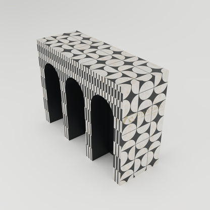 hallway table with black and white half circle pattern