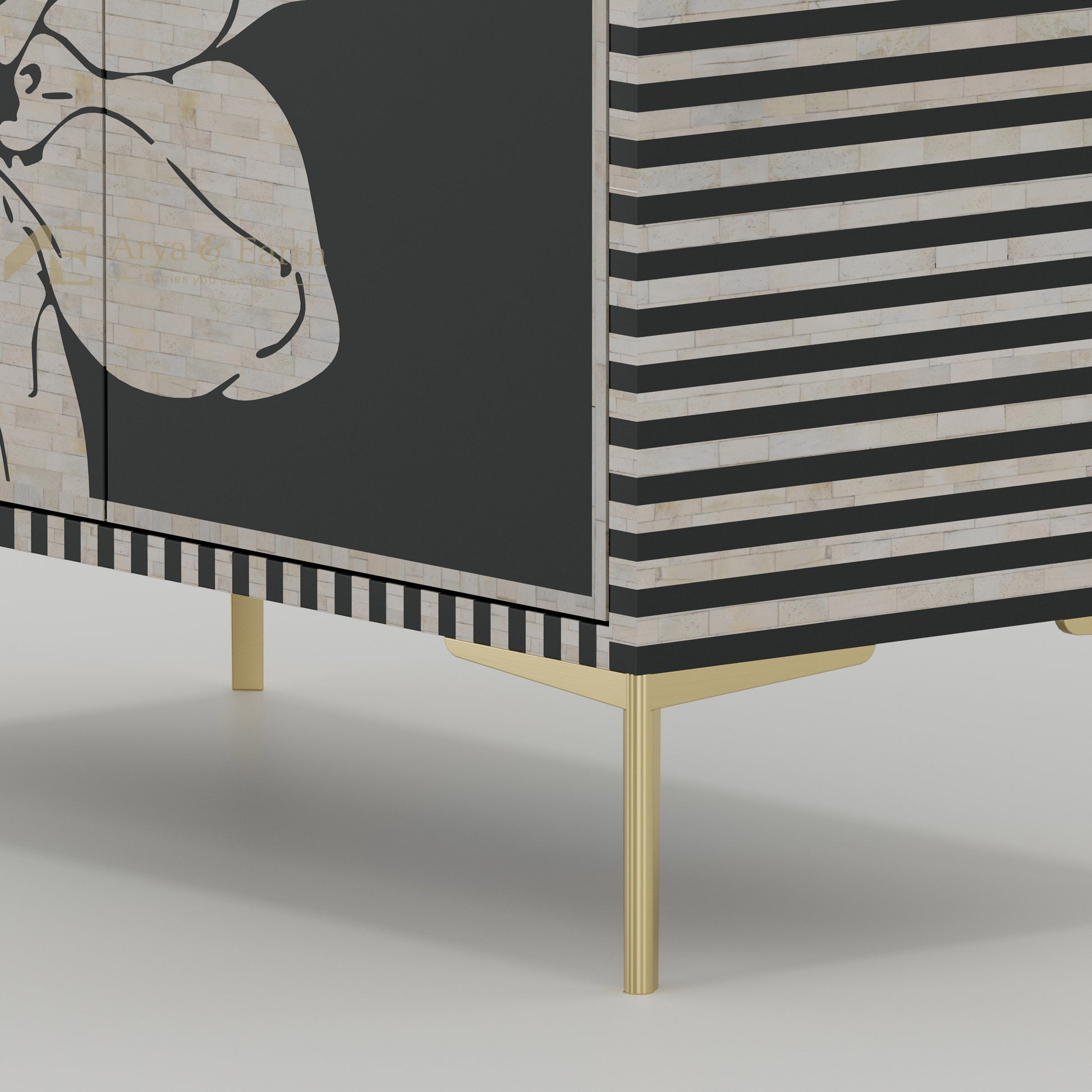 Cabinet with black and white striped design and gold legs