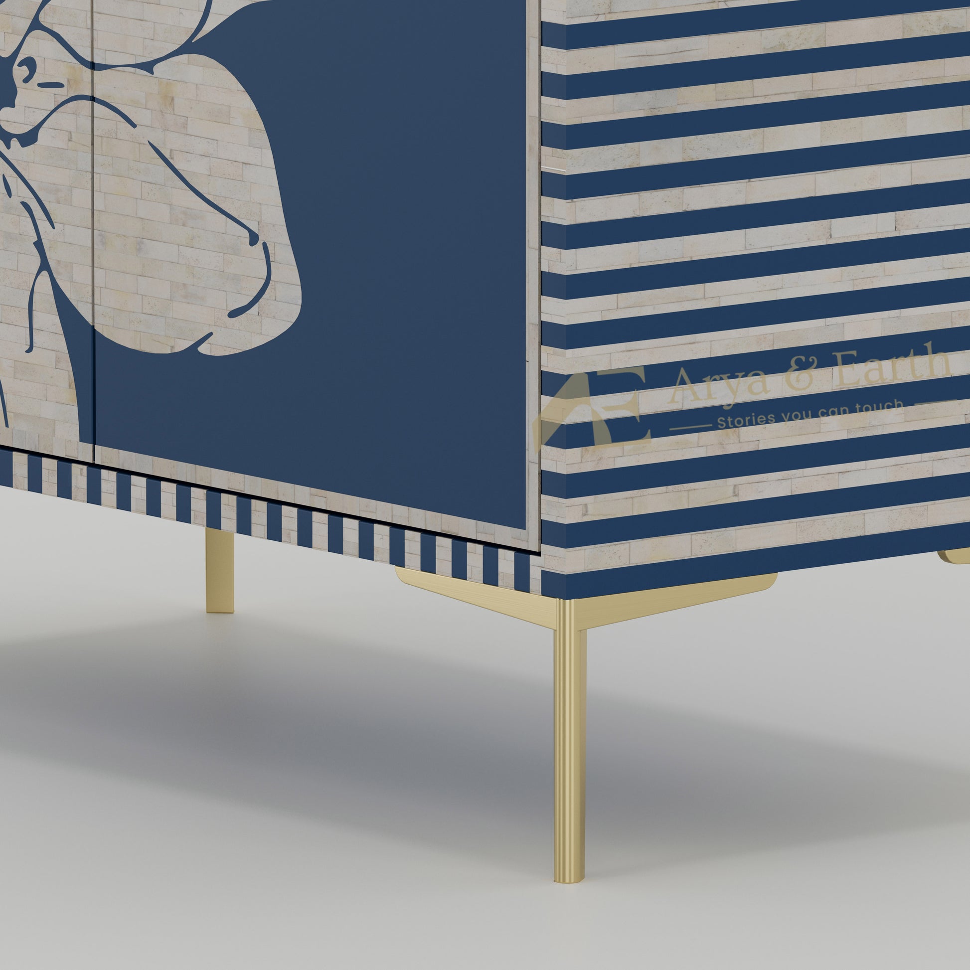 Gold accents on a blue cabinet